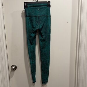 lululemon athletica Teal Printed High-Rise Leggings. Gently used